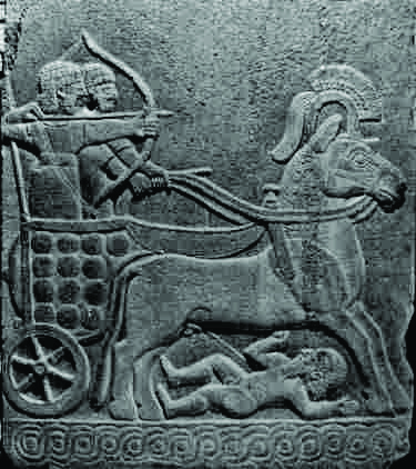 Hittite relief with a chariot and swirls Hittite relief with a chariot and swirls